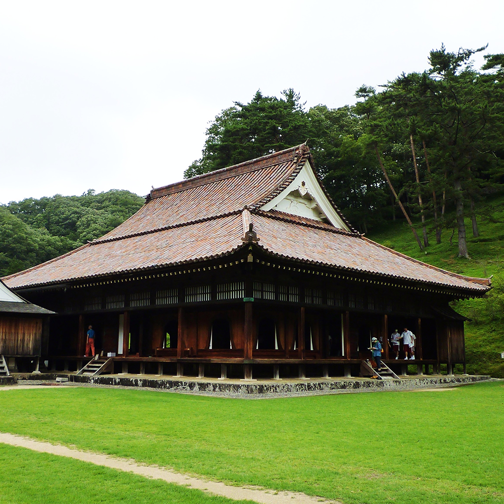 The Shizutani School large wooden building on a green grassy hill near Bizen Japan