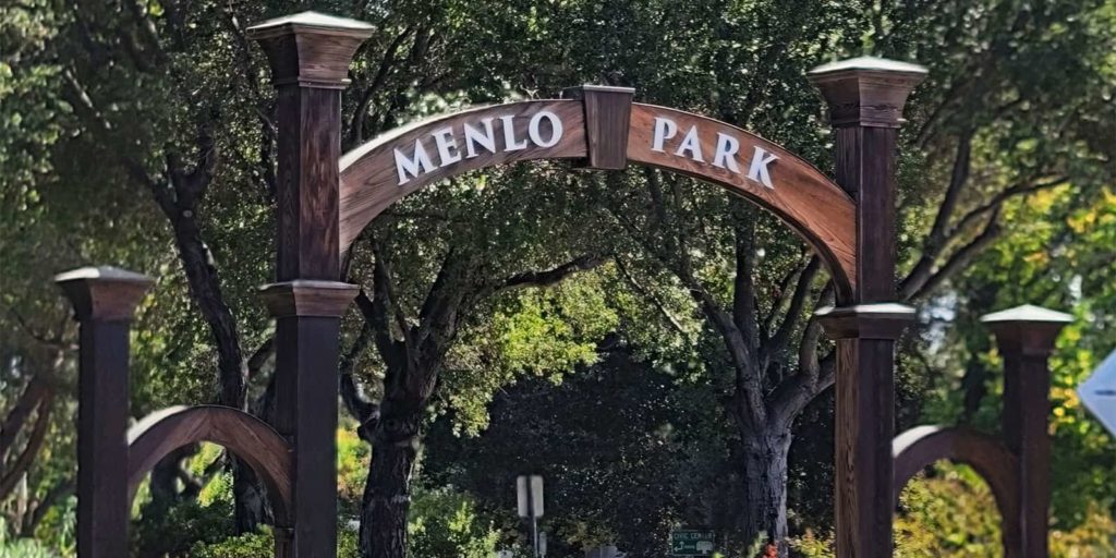 The entrance to the Menlo Park civic center through the recreated wood Menlo Park Gates